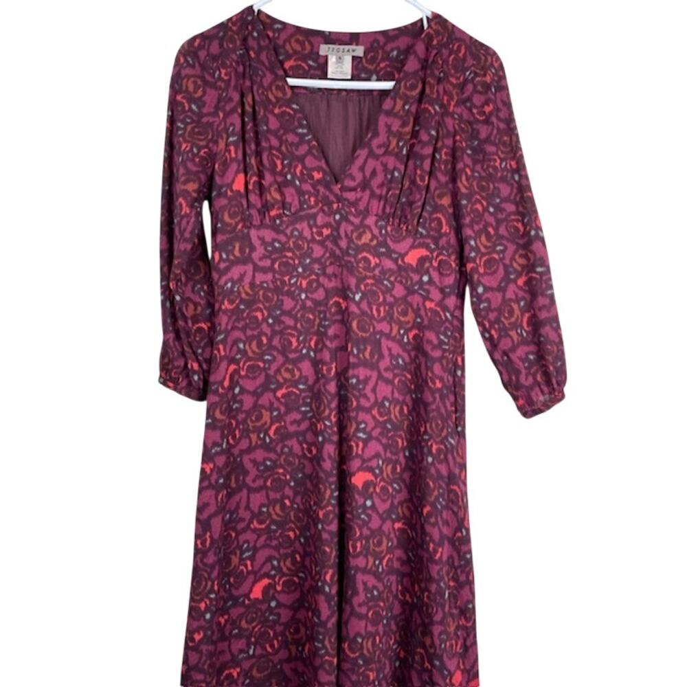 Jigsaw women's silk print dress featuring a v-neckline.